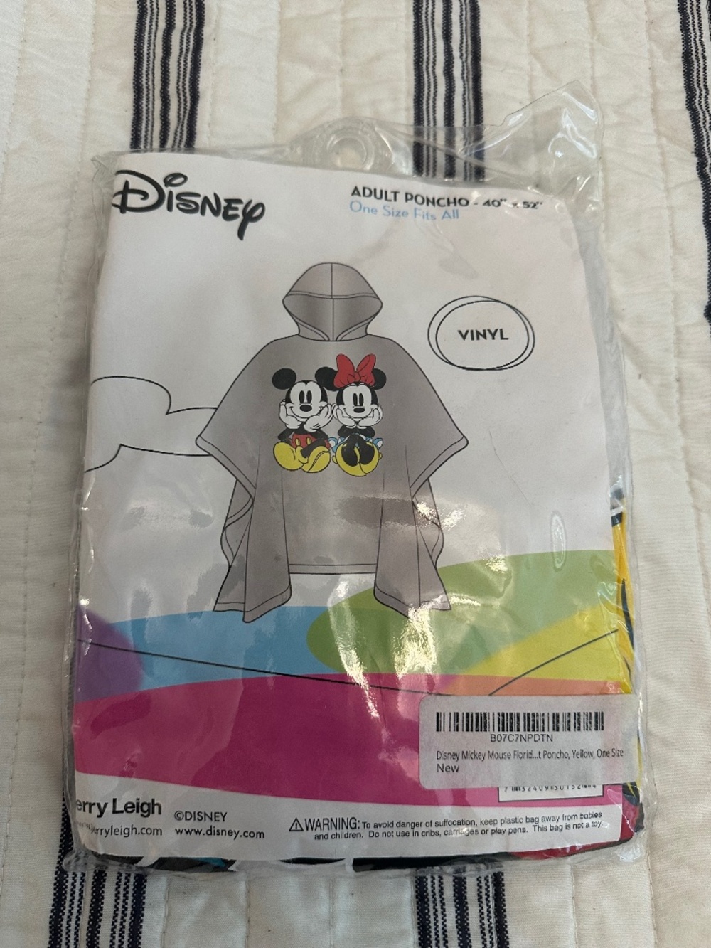 4 adult and 2 kid’s Disney ponchos